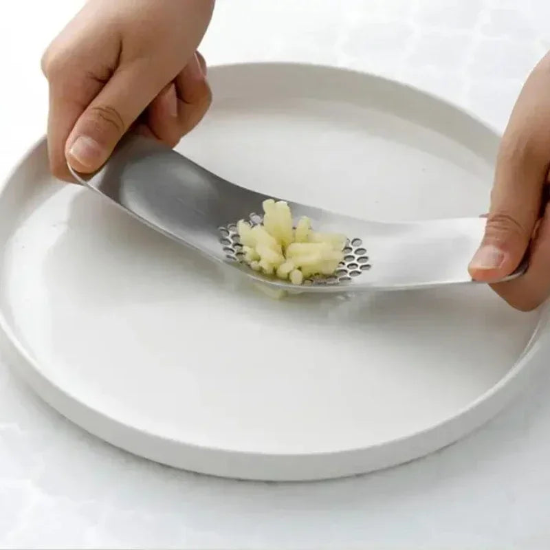 Presse ail à bascule de gauche à droite ergonomique